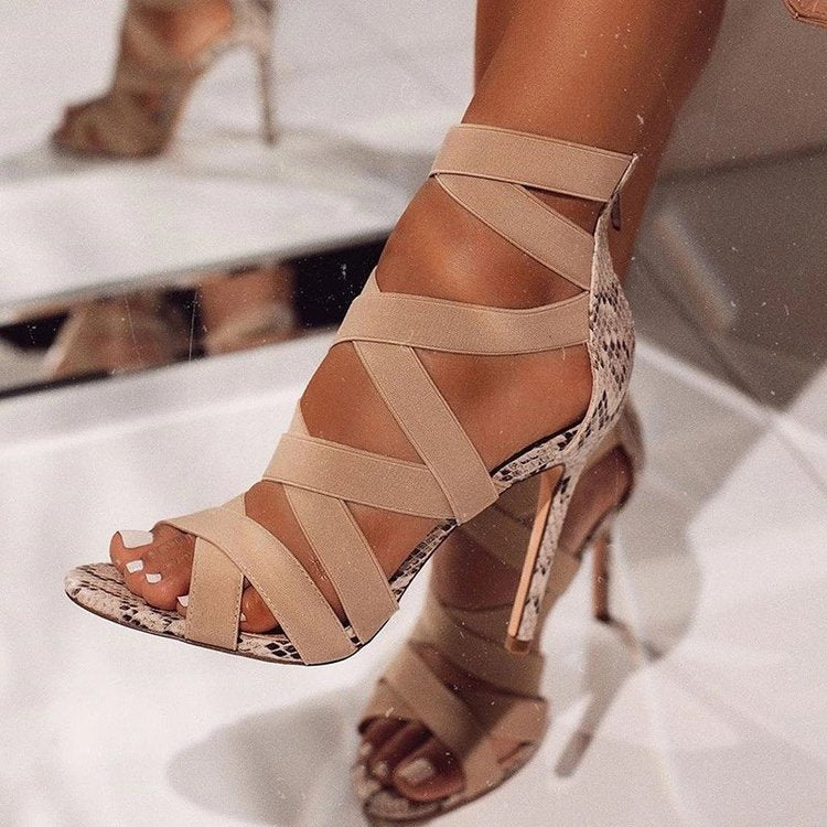 High-heeled shoes women's summer European and American Roman style super high-heeled stiletto elastic belt bag heel and back zipper sandals wholesale