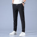 Ice silk casual trousers men's summer thin section 2022 Korean version of work work trend loose straight breathable sports pants